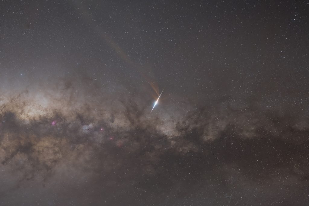 Milky Way arch panorama over landscape – starry sky photography by Junrui Ye