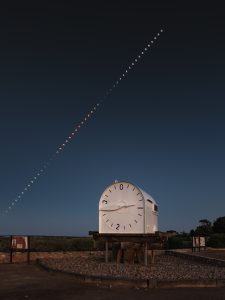 Port Germein Tide Clock with Total Lunar Eclipse Sequence – Starry Sky Photography Total lunar eclipse sequence above the tide clock at Port Germein, South Australia – starry sky photography by Junrui Ye