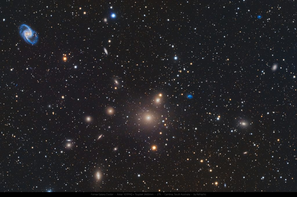 Fornax Galaxy Cluster featuring elliptical galaxy NGC 1399 surrounded by numerous faint members, captured through long-exposure deep sky astrophotography by Junrui Ye