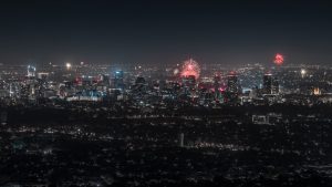 New Year’s Eve fireworks lighting up the Adelaide city skyline as seen from Mount Osmond Lookout, South Australia