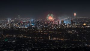New Year’s Eve fireworks lighting up the Adelaide city skyline as seen from Mount Osmond Lookout, South Australia
