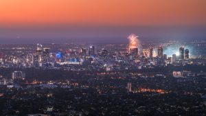 New Year’s Eve fireworks lighting up the Adelaide city skyline as seen from Mount Osmond Lookout, South Australia
