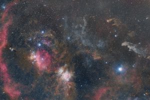 Wide-field view of the Orion Nebula region with M42, surrounding emission nebulae, and dense star fields captured in the winter night sky