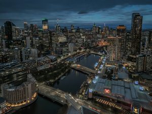 Melbourne City at Night – Aerial Skyline and Yarra River Drone Photography Melbourne city at night with skyline and Yarra River illuminated seen from drone aerial perspective in Victoria Australia