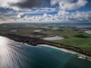 Coastal Salt Lakes near Kemp Bay, Yorke Peninsula Drone panorama of coastal salt lakes near Kemp Bay on the Yorke Peninsula, South Australia, with the Southern Ocean meeting farmland and pink lakes.
